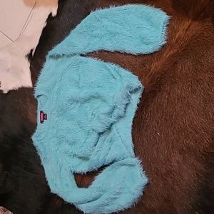 Rock and roll denim cowgirl fuzzy turquoise sweater